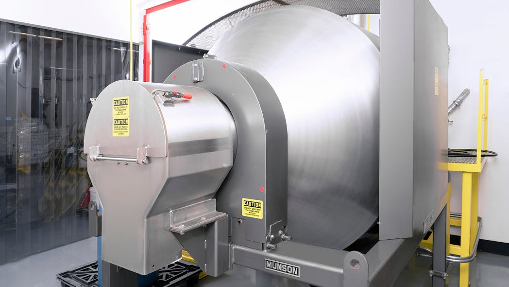 The mixer&rsquo;s inlet and outlet (shown) remain stationary while the drum rotates, allowing hard connections to upstream mechanical or pneumatic conveyors and continuous mixing as material is discharged.