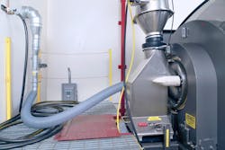 A dehumidification line from an adjacent room removes moisture from the vessel between batches containing liquid additions. A dehumidification line from an adjacent room removes moisture from the vessel between batches containing liquid additions.