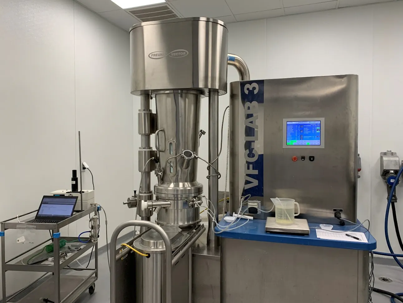Nir Inline Machine Process development scientists study the efficacy of using near ...