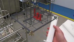 An AR model of a custom-designed wash rack in a pharmaceutical cleaning system appears next to its matching real-world wash rack to help workers set each item to be washed in its proper place for complete cleaning without error. An AR model of a custom-designed wash rack in a pharmaceutical cleaning system appears next to its matching real-world wash rack to help workers set each item to be washed in its proper place for complete cleaning without error.