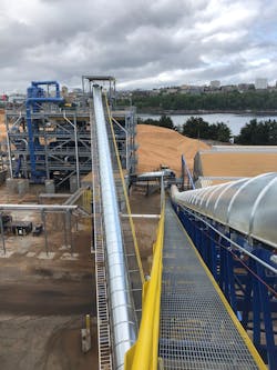 These conventional conveyors include weather covers to protect the material from the environment and a walkway for easy access during maintenance.