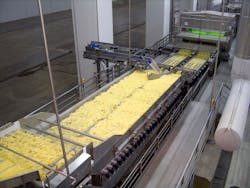 Key Iso-Flo conveyors, working alongside a Sliver Sizer Remover, remove slivers and water from potato strips and feed an ADR automatic defect removal system. Key Iso-Flo conveyors, working alongside a Sliver Sizer Remover, remove slivers and water from potato strips and feed an ADR automatic defect removal system.