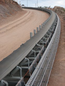 This overland belt conveyor is curved to follow the terrain.