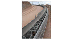 This overland belt conveyor is curved to follow the terrain.