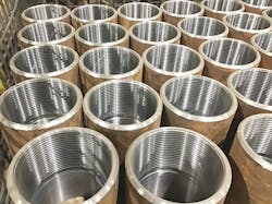 Caption: Premium couplings are machined to the tightest tolerances and may incorporate substantial design changes, often to the threads.