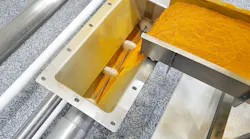 A tubular cable drag conveyor uses a cable with discs attached at set intervals within a tube to gently pull powder from inlet to discharge.