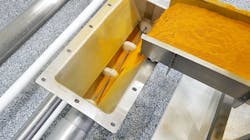 A tubular cable drag conveyor uses a cable with discs attached at set intervals within a tube to gently pull powder from inlet to discharge. A tubular cable drag conveyor uses a cable with discs attached at set intervals within a tube to gently pull powder from inlet to discharge.