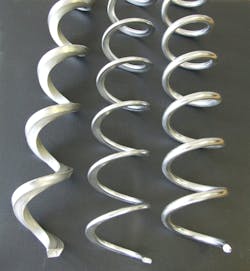 The flexible screw conveyor’s only moving part, the spiral (or screw), continuously mixes the material as it conveys. The flexible screw conveyor’s only moving part, the spiral (or screw), continuously mixes the material as it conveys.