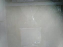 Figure 8: Discharge from a hopper of combustible coal dust, generating a dense dust cloud. Figure 8: Discharge from a hopper of combustible coal dust, generating a dense dust cloud.