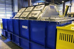 FEECO pugmill mixer with access/inspection doors. FEECO pugmill mixer with access/inspection doors.