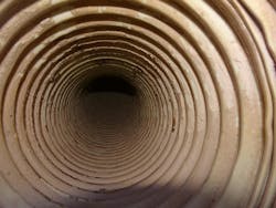 Figure 4: Hose interior with convolutions and material buildup. Figure 4: Hose interior with convolutions and material buildup.