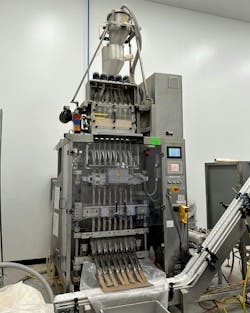 A vacuum conveyor keeps this stick-pack machine full and eliminates ladder climbing and manual container dumping. A vacuum conveyor keeps this stick-pack machine full and eliminates ladder climbing and manual container dumping.