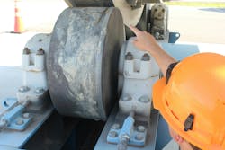 A FEECO customer service engineer discusses rotary drum components. A FEECO customer service engineer discusses rotary drum components.