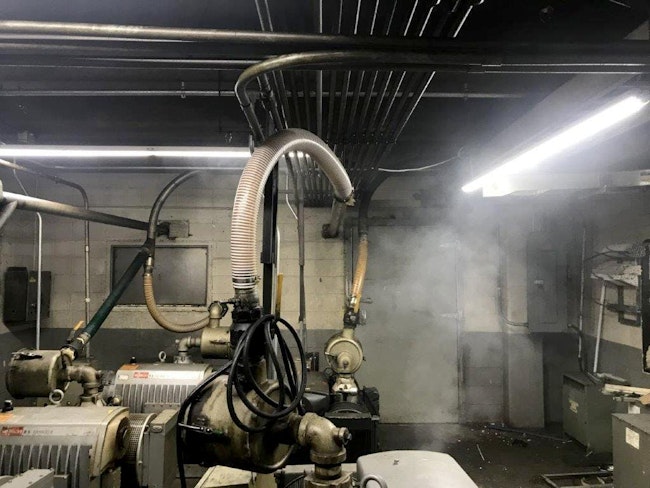 The challenge is to quickly and accurately distinguish between smoke from an actual fire and the typical background airborne particulates during meat processing.