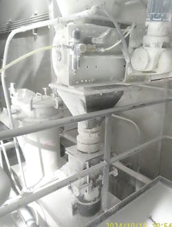 Figure 2. This system does not meet Ingredient Transport System requirements under NFPA 660 because it lacks a screener, the small dust collector fan represents an ignition source, and the system is not properly grounded and bonded. Figure 2. This system does not meet Ingredient Transport System requirements under NFPA 660 because it lacks a screener, the small dust collector fan represents an ignition source, and the system is not properly grounded and bonded.