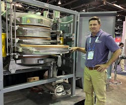 Brooke Dessert of Great Western Manufacturing demonstrates the company's Qi (quick inspection) sifter, which features a new retractable sieve design, allowing a single worker to easily inspect sieves, screens, gaskets, cleaners, and domes in a fraction of the time required by previous designs. Brooke Dessert of Great Western Manufacturing demonstrates the company's Qi (quick inspection) sifter, which features a new retractable sieve design, allowing a single worker to easily inspect sieves, screens, gaskets, cleaners, and domes in a fraction of the time required by previous designs.