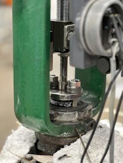 Close-up of a control valve with a packing ring being installed. Close-up of a control valve with a packing ring being installed.