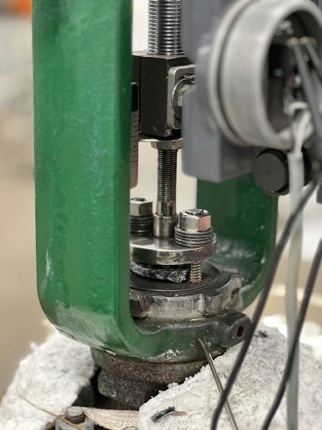 Close-up of a control valve with a packing ring being installed.