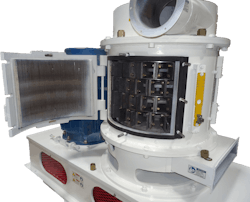 Figure 6. Rotormills are constructed with a tall, vertical rotor fitted within a body lined with a corrugated surface. The rotor imparts centrifugal force to the material and airflow, creating high shear as particles impact one another and the lining. Figure 6. Rotormills are constructed with a tall, vertical rotor fitted within a body lined with a corrugated surface. The rotor imparts centrifugal force to the material and airflow, creating high shear as particles impact one another and the lining.