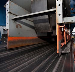 Figure 1. A properly structured enclosure is slightly elevated, with dust curtains, an external wearliner, and adequate skirting. Figure 1. A properly structured enclosure is slightly elevated, with dust curtains, an external wearliner, and adequate skirting.