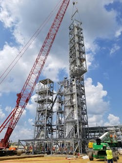 A horizontal-built truckable module installed vertically at the final project site. A horizontal-built truckable module installed vertically at the final project site.