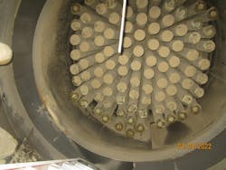 Figure 4. In vertical filter bag and cartridge dust collectors, the incoming air rises from the dust collector inlet up to and between the filters. Figure 4. In vertical filter bag and cartridge dust collectors, the incoming air rises from the dust collector inlet up to and between the filters.