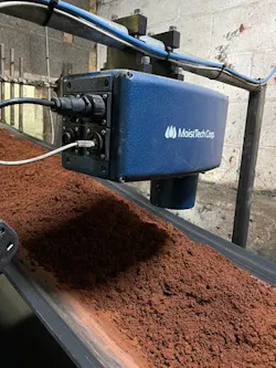 Inline moisture sensor above conveyor Inline moisture sensor above conveyor