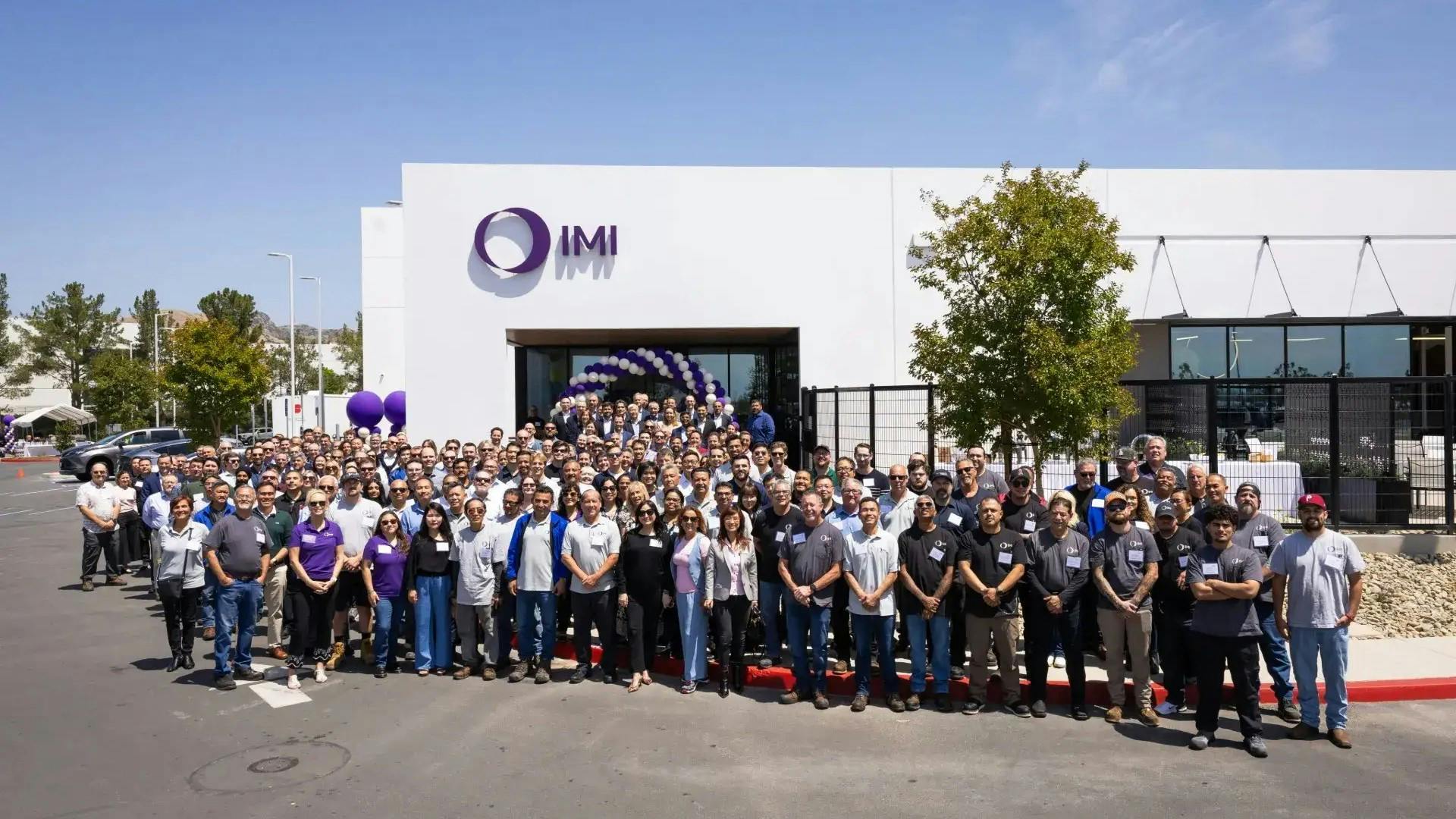 Employees gather outside IMI&rsquo;s new Lake Forest facility to mark the opening of the Southern California Process Automation site.