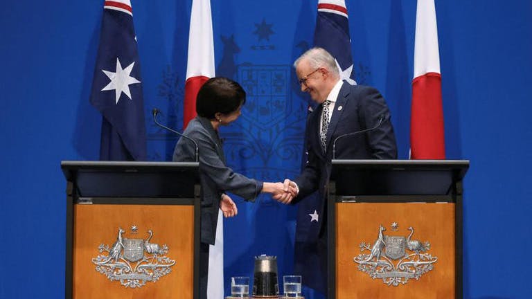 Japan's Prime Minister Sanae Takaichi shakes hands with Australia's Prime Minister Anthony Albanese during a press conference at Parliament House in Canberra, Australia, May 4, 2026.