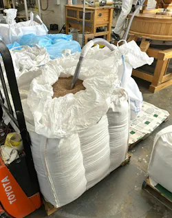 Vacuum conveyor transferring grain from bulk bag into processing equipment. Vacuum conveyor transferring grain from bulk bag into processing equipment.