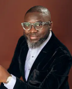 6a43f2e0937f54210319fb04 Femi Headshot