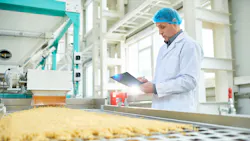 Worker at a conveyor