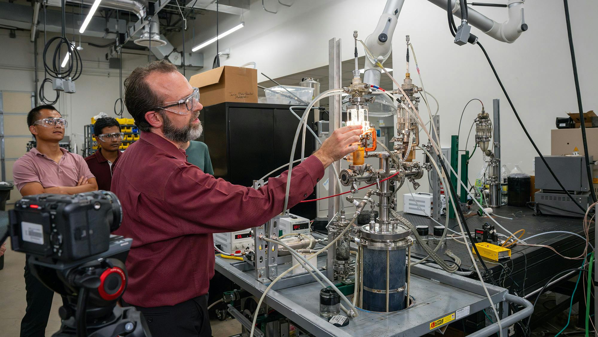 Dr. David Staack demonstrates the plasma-based reactor