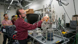 Dr. David Staack demonstrates the plasma-based reactor