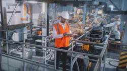Male engineer working in a factory