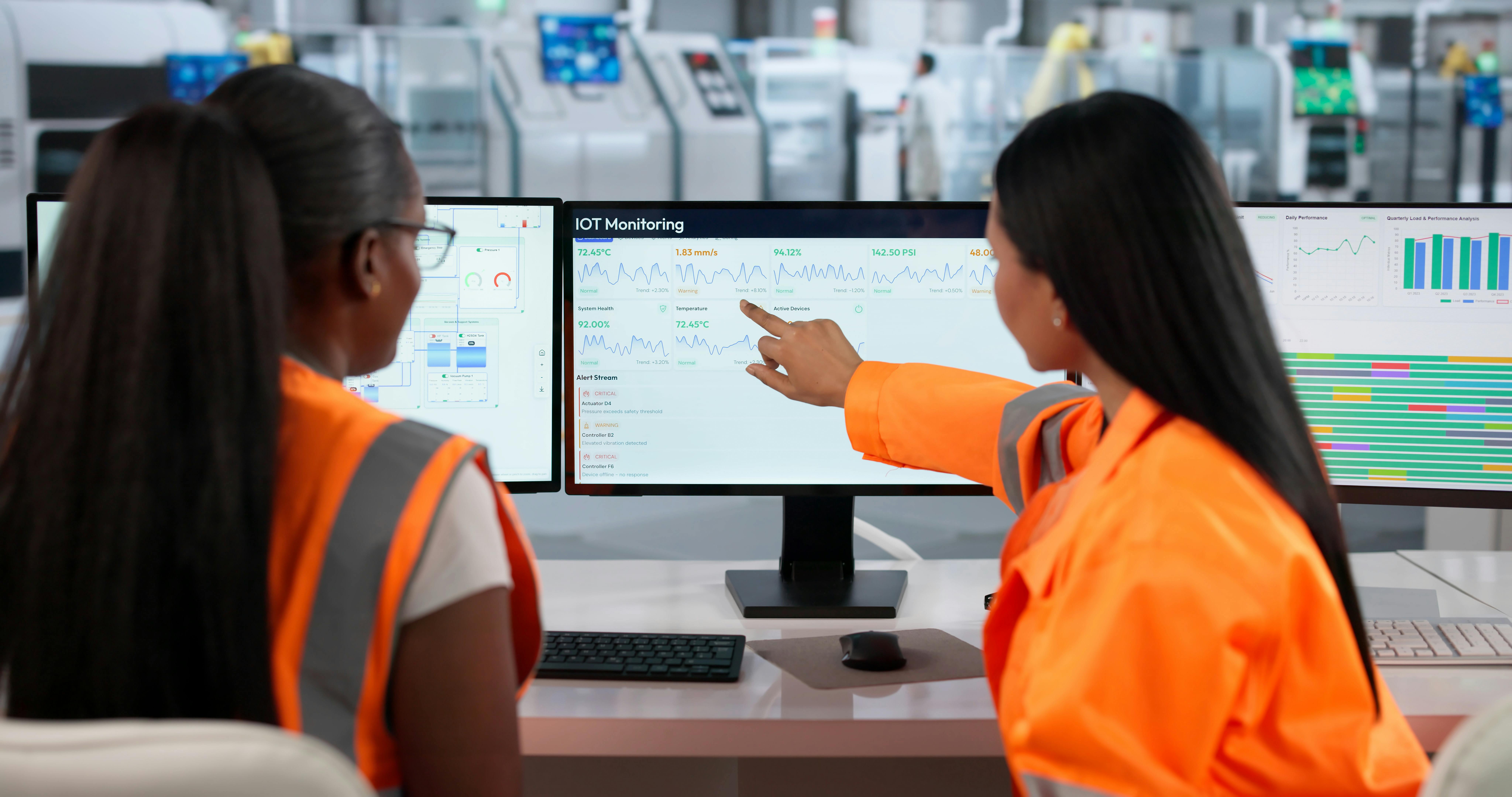 Industrial Engineer Analyzes Real-time Data To Improve Factory Automation Efficiency.