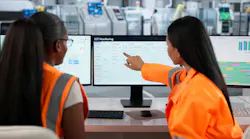 Industrial Engineer Analyzes Real-time Data To Improve Factory Automation Efficiency.