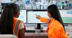 Industrial Engineer Analyzes Real-time Data To Improve Factory Automation Efficiency.