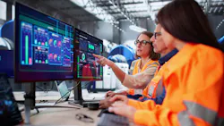 Engineers Meeting Maintenance Operator At Control Panel